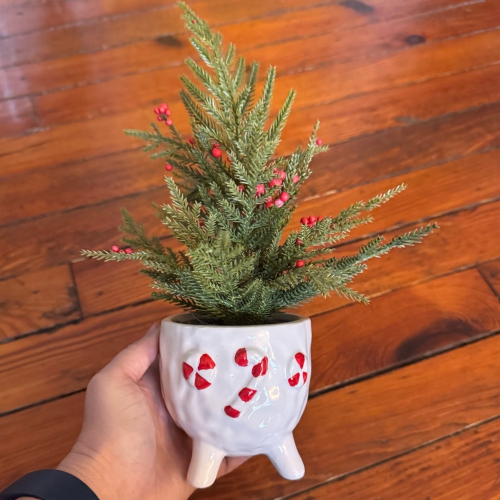 Faux Plant in a Holiday Themed Candy Cane Pot